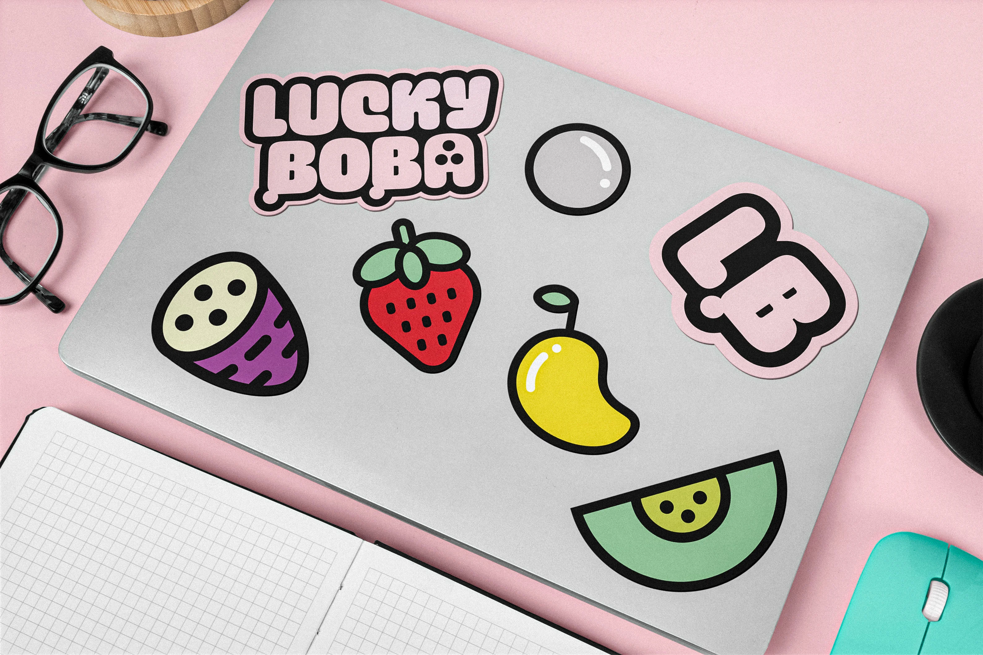 Custom illustrations and icons for Lucky Boba on a Laptop